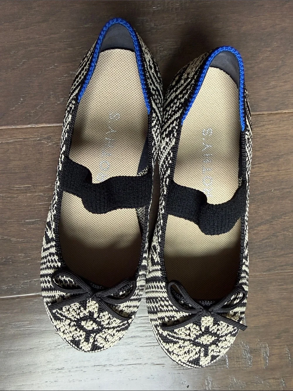 Rothy's Black and Cream Knit Ballet Flats with Blue Trim